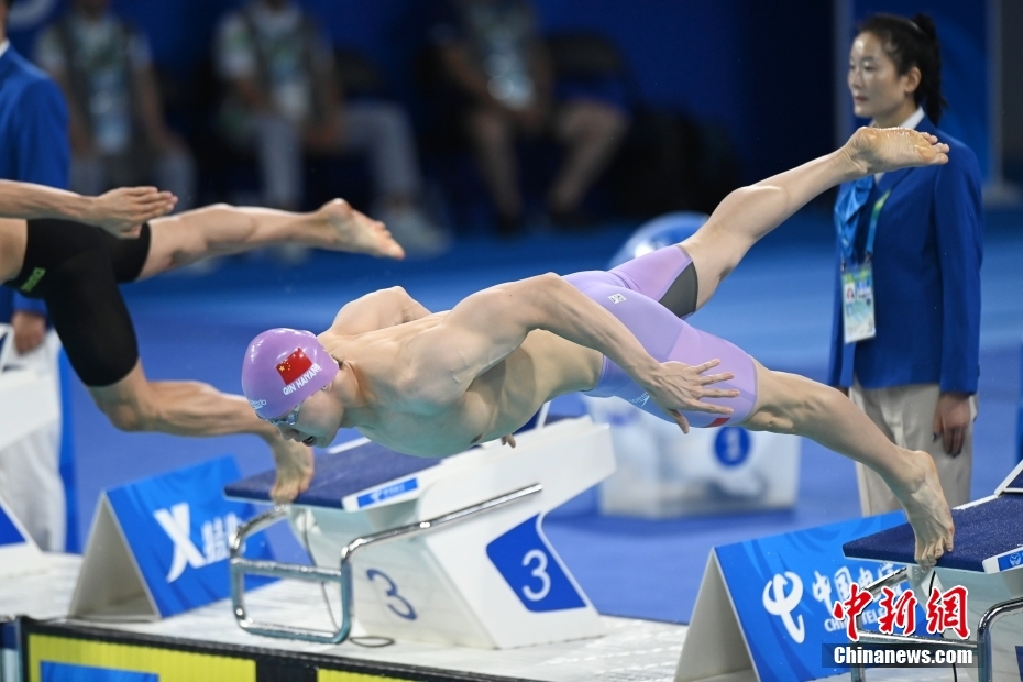 覃海洋勇夺男子100米蛙泳金牌，中国游泳再添荣耀，开启新篇章